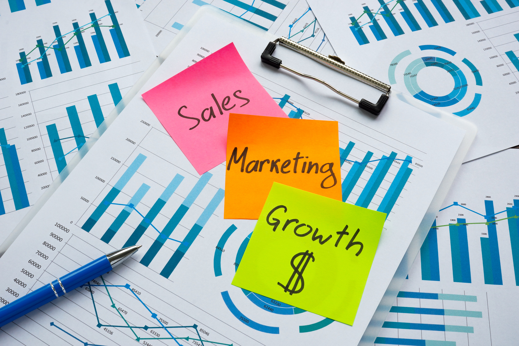 Words Sales marketing and profit growth as plan on the charts.